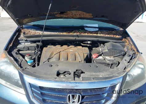 2009 Honda Odyssey Ex-L from USA, damaged, VIN 5FNRL38659B051677